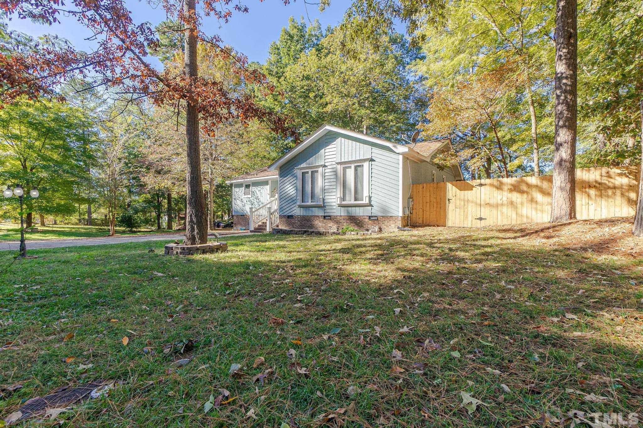2207 Dorety Place Raleigh, NC 27604 - Photo 27 of 27 a view of a house with a yard