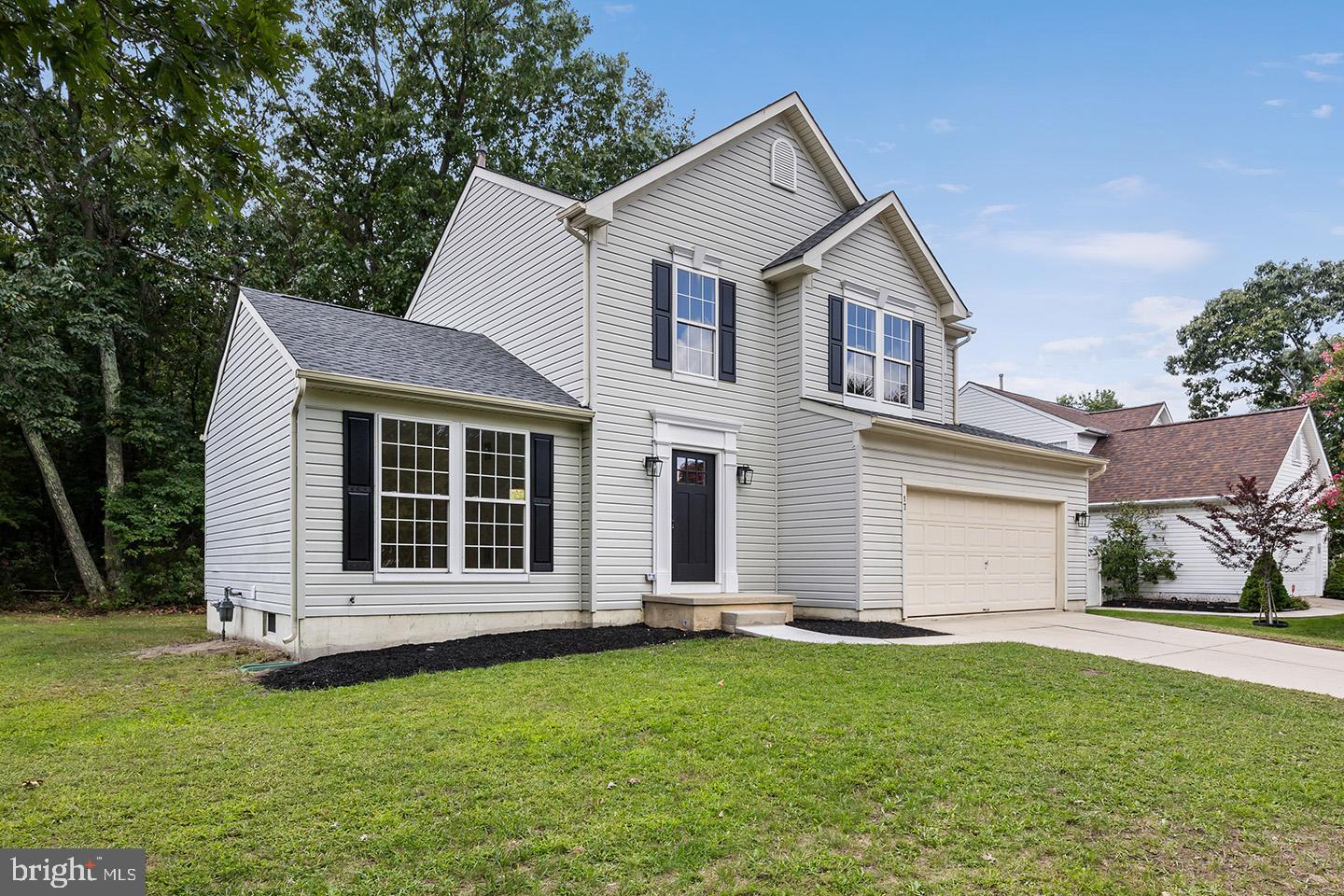 17 Arlington Road Sicklerville, NJ 08081 - Photo 2 of 43 a view of a house with a yard