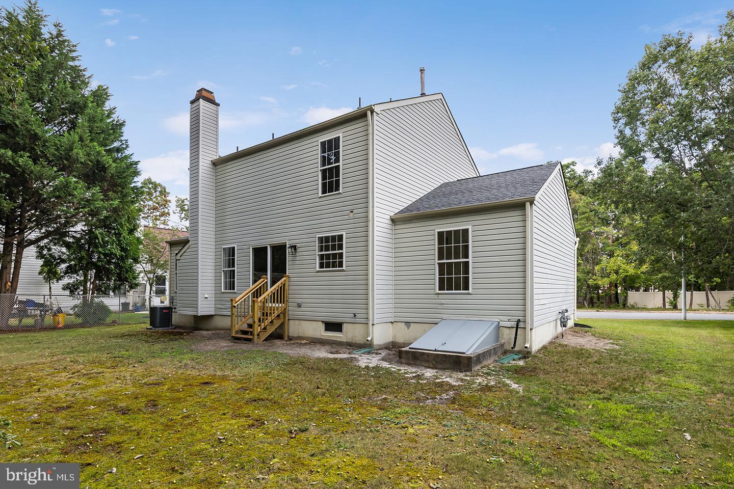 17 Arlington Road Sicklerville, NJ 08081 - Photo 33 of 43 a view of a house with backyard and trees