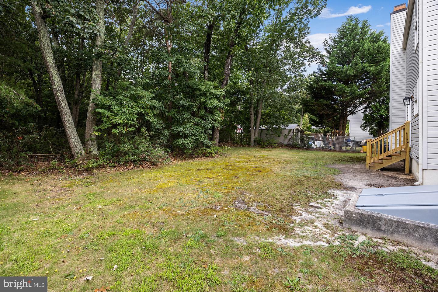 17 Arlington Road Sicklerville, NJ 08081 - Photo 34 of 43 a view of swimming pool with a yard
