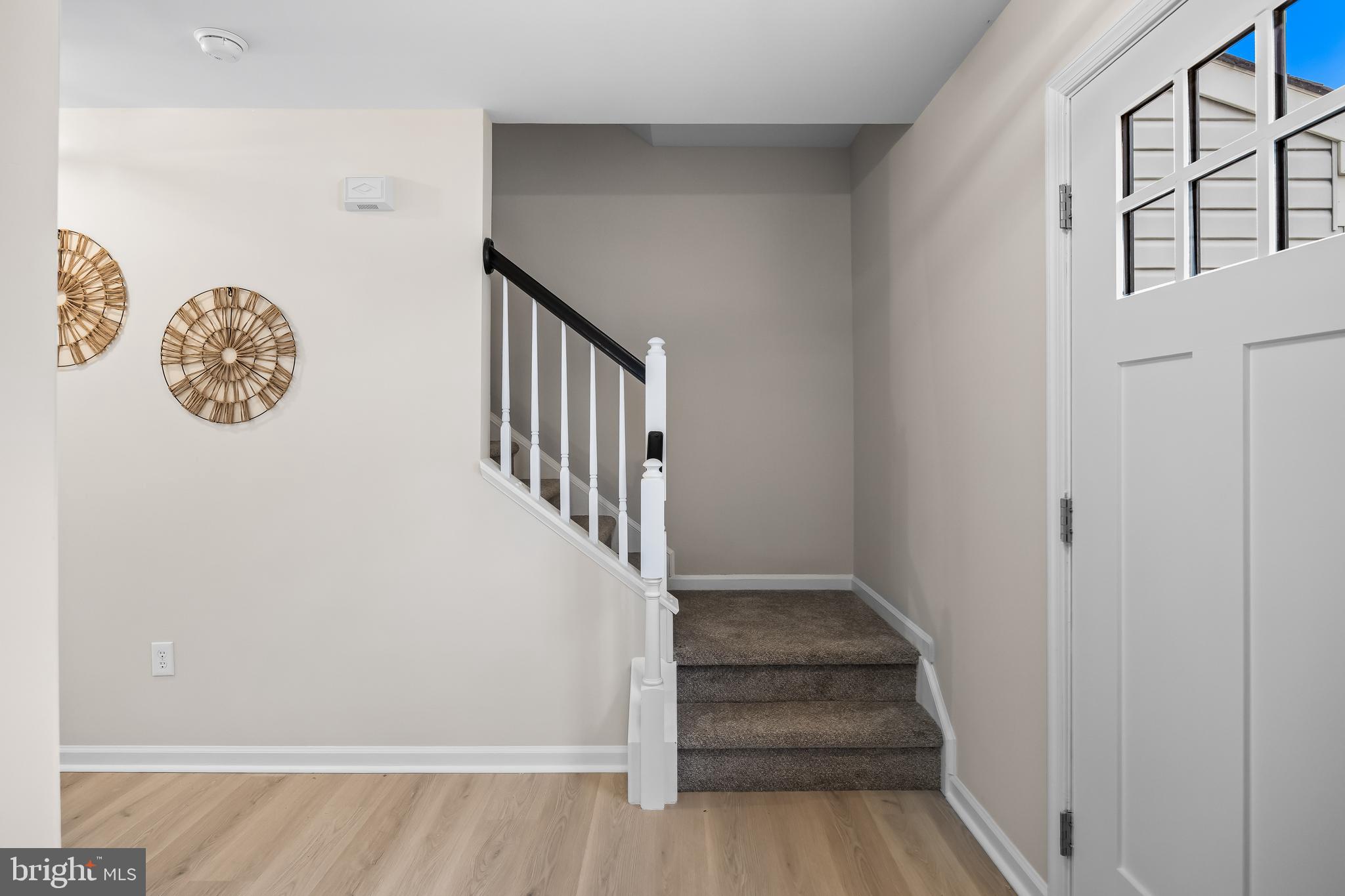 17 Arlington Road Sicklerville, NJ 08081 - Photo 5 of 43 a view of entryway with stairs and wooden floor