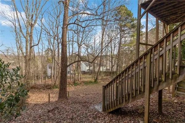 a view of stairs and trees