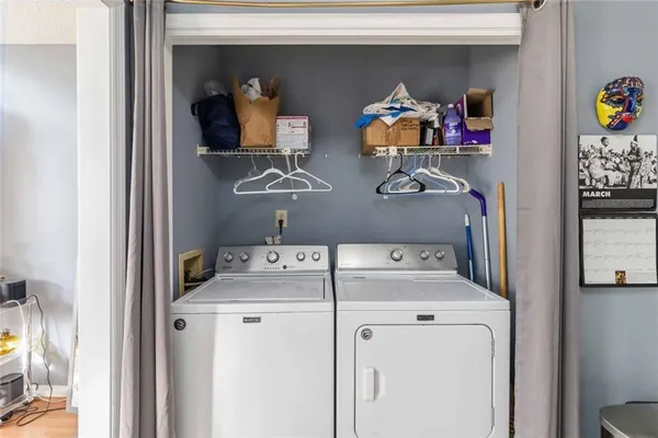 a utility room with dryer and washer