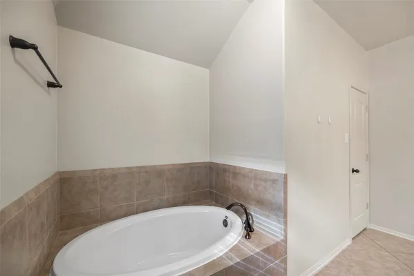 a bathroom with a bathtub