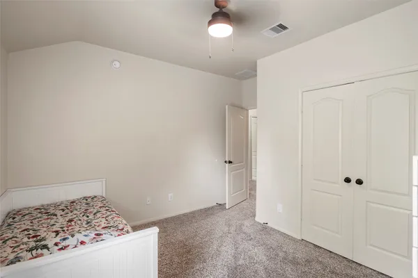 a view of a room with a wardrobe space