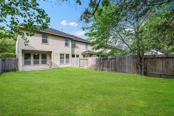 a view of a backyard with a garden