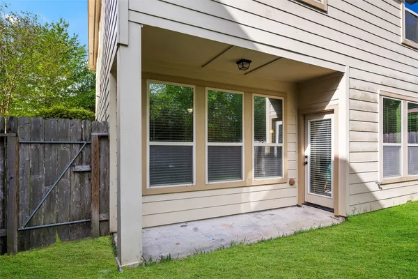 a view of front door of house with yard