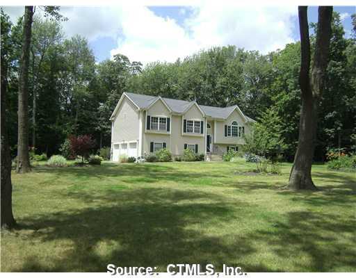 82 Straitsville Road Prospect, CT 06712 - Photo 1 of 1 a front view of a house with a yard