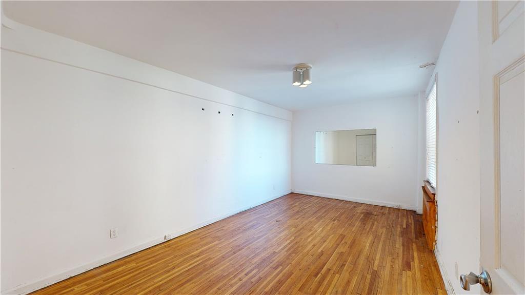 150 West End Avenue, Unit 5H Brooklyn, NY 11235 - Photo 12 of 17 a view of a room with wooden floor