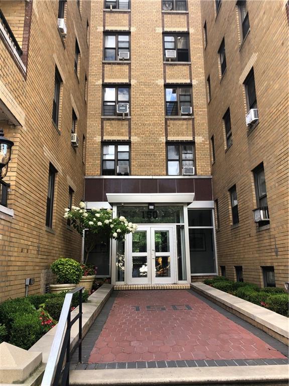 150 West End Avenue, Unit 5H Brooklyn, NY 11235 - Photo 17 of 17 a view of a building with a yard