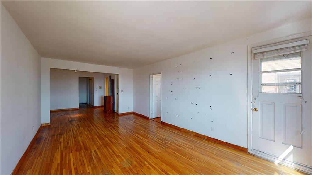 150 West End Avenue, Unit 5H Brooklyn, NY 11235 - Photo 6 of 17 a view of an empty room with wooden floor