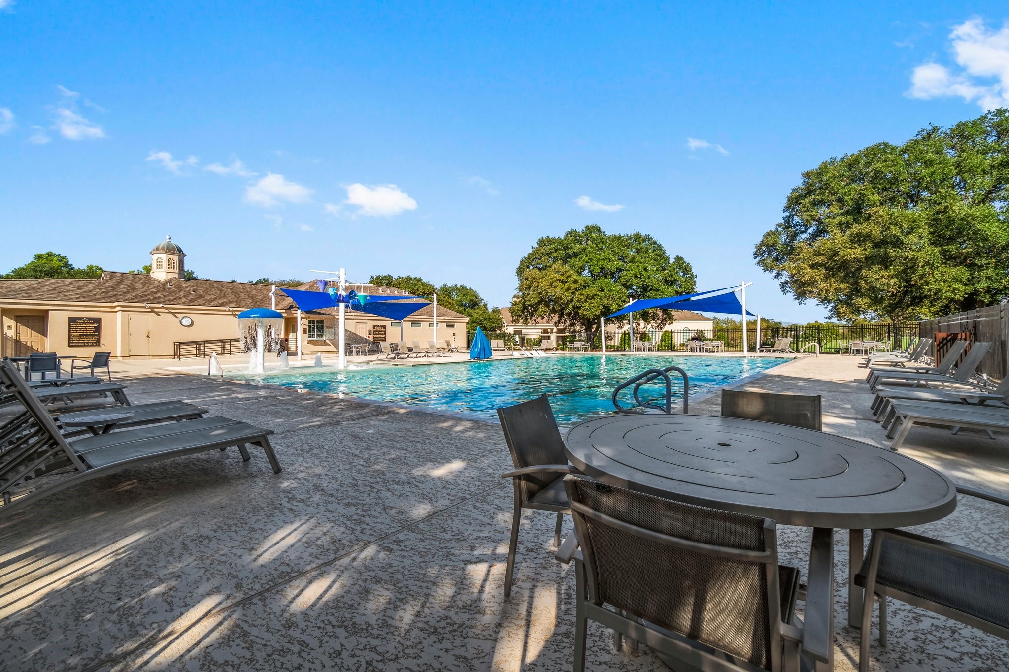 3 West Shore Lane Montgomery, TX 77356 - Photo 16 of 50 a view of a patio with table and chairs and potted plants