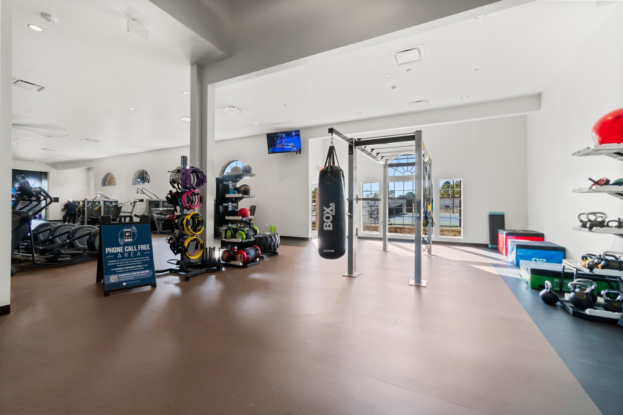 3 West Shore Lane Montgomery, TX 77356 - Photo 23 of 50 a gym area with gym equipment and a large window
