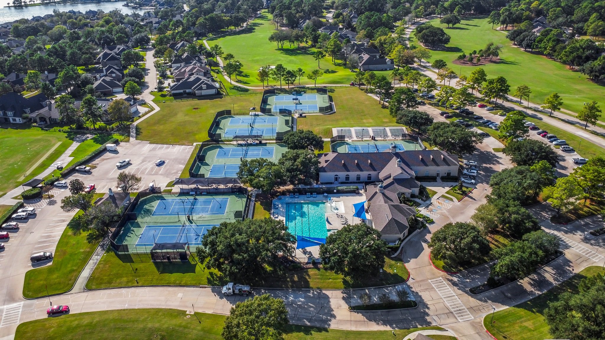 3 West Shore Lane Montgomery, TX 77356 - Photo 33 of 50 an aerial view of house with yard swimming pool and outdoor seating