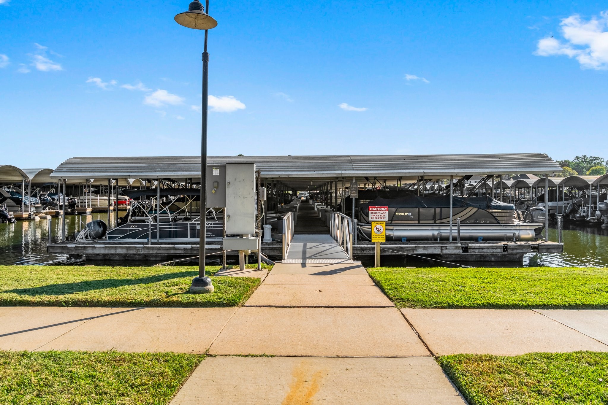 3 West Shore Lane Montgomery, TX 77356 - Photo 34 of 50 a view of a swimming pool with a yard and plants