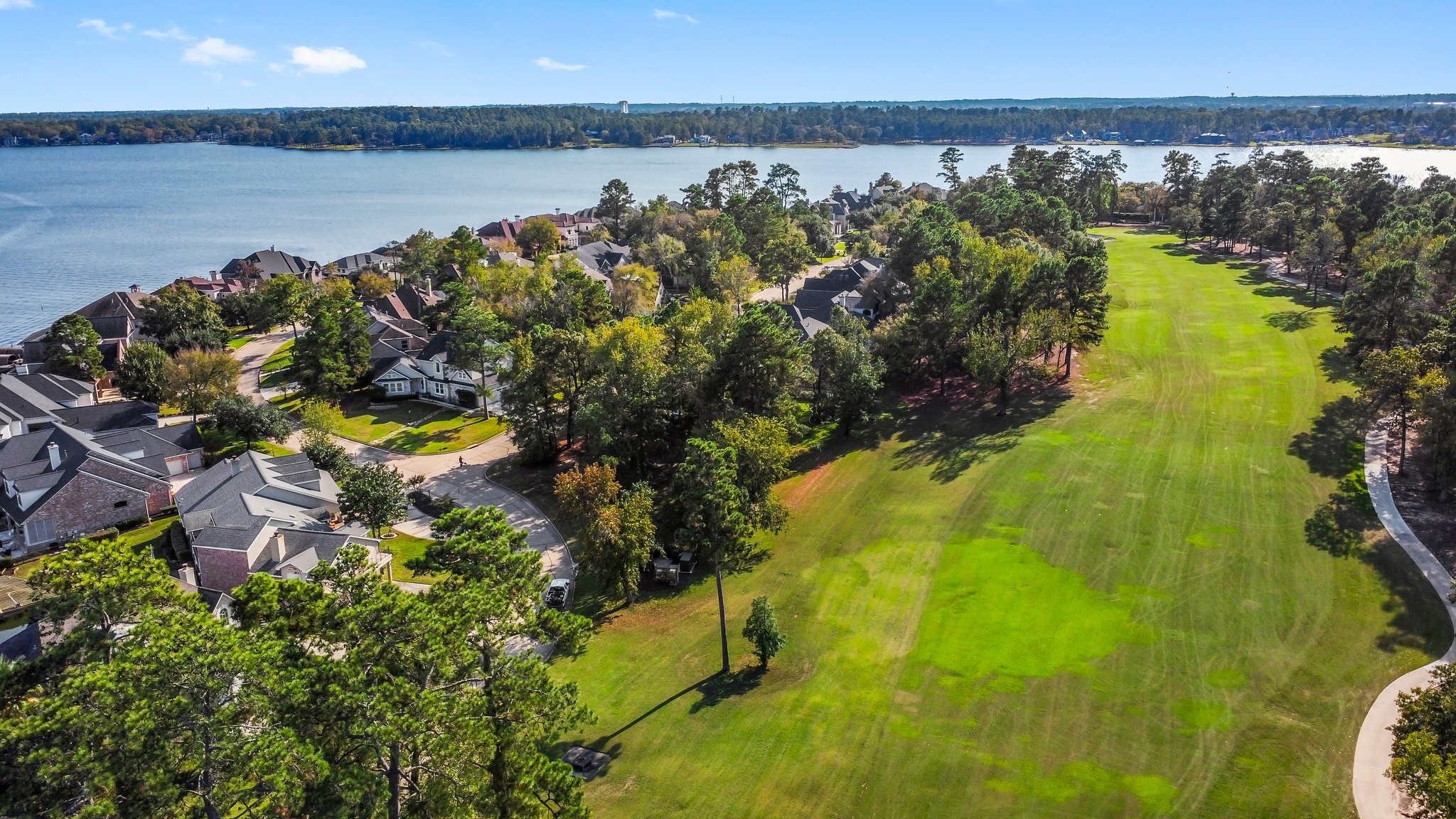 3 West Shore Lane Montgomery, TX 77356 - Photo 50 of 50 a view of a lake with a beach