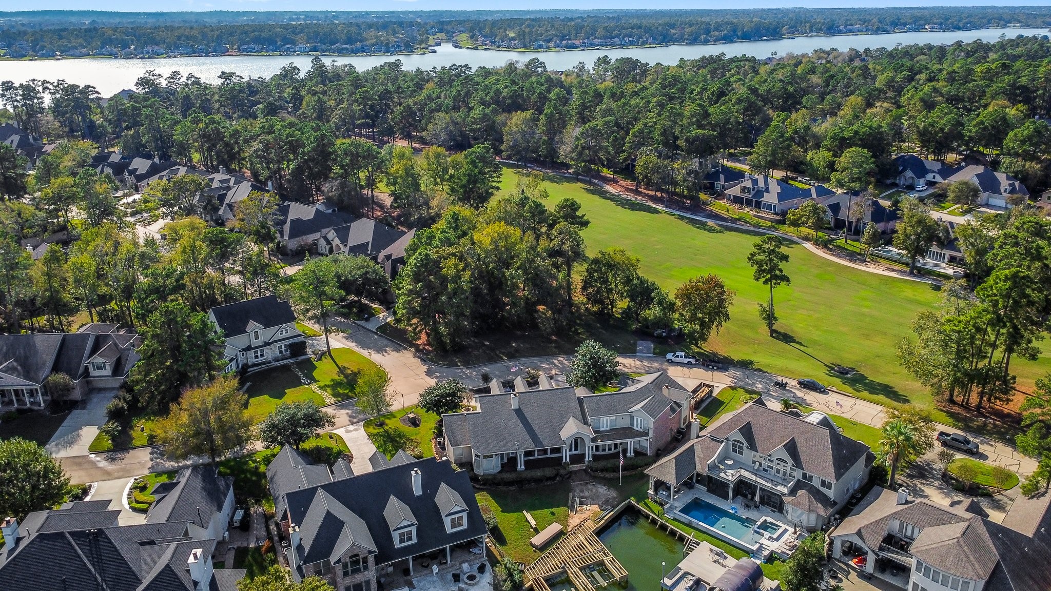 3 West Shore Lane Montgomery, TX 77356 - Photo 5 of 50 an aerial view of a swimming pool patio and outdoor seating