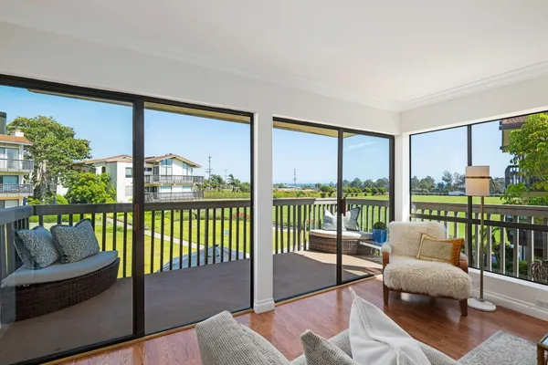 a balcony with furniture