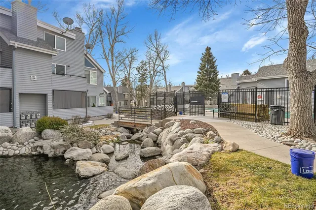 a view of a backyard of the house