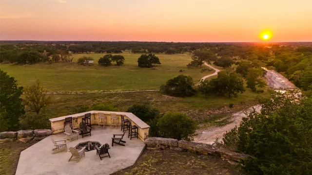 a view of a yard with an outdoor space