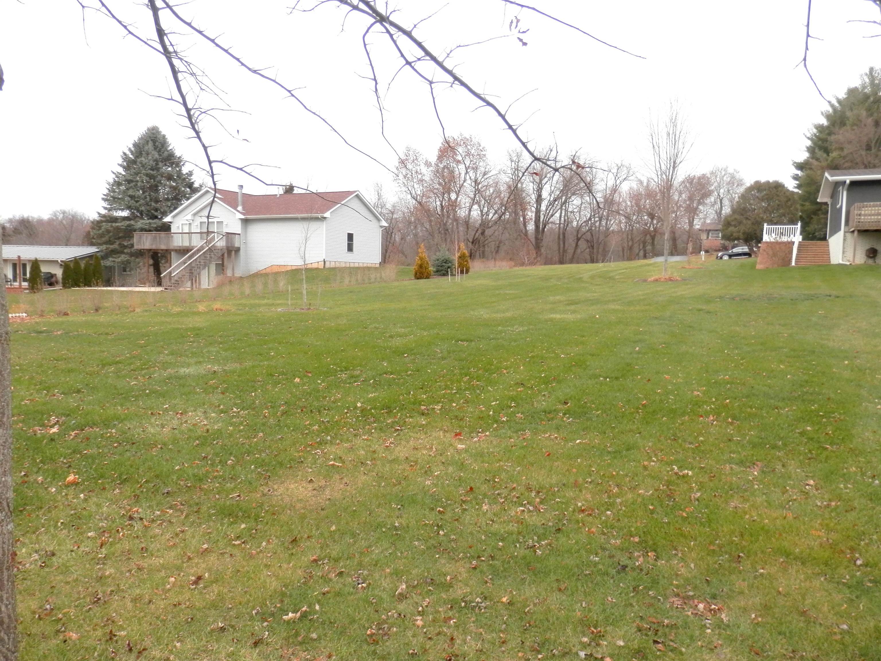 979 Winborne Road Lake Summerset, IL 61019 - Photo 6 of 9 a backyard of a house with lots of green space