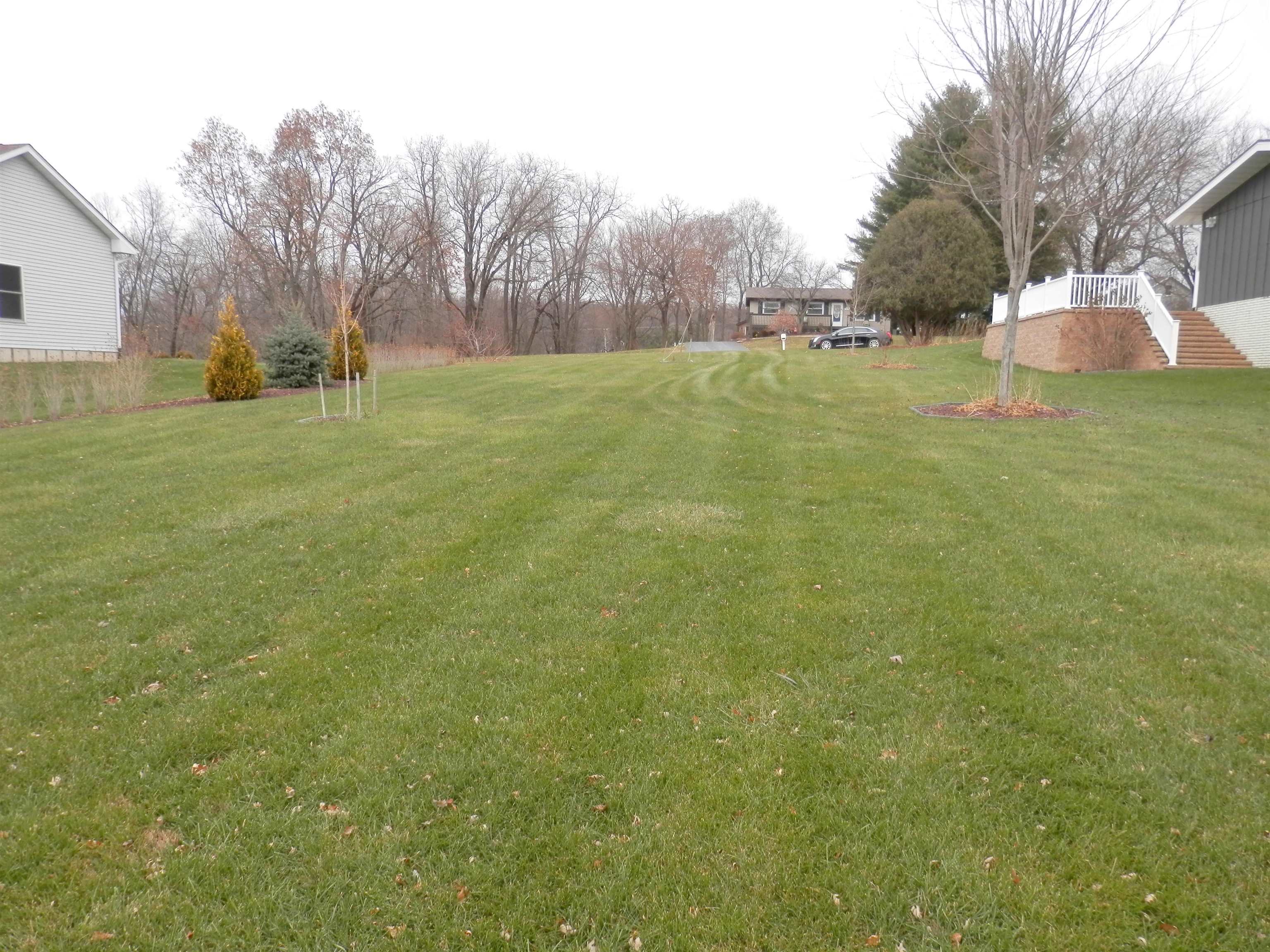 979 Winborne Road Lake Summerset, IL 61019 - Photo 8 of 9 a view of a field with large trees
