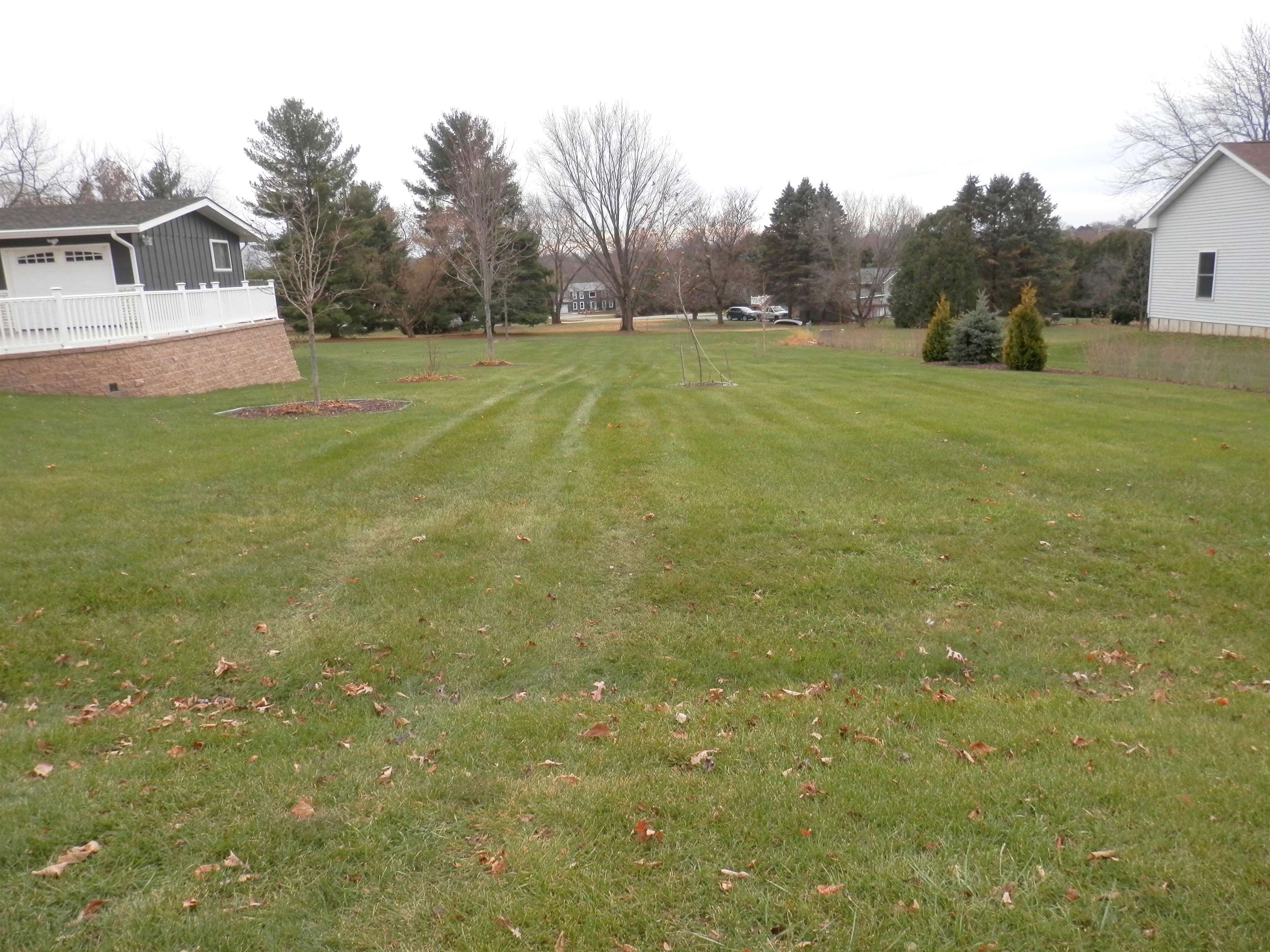 979 Winborne Road Lake Summerset, IL 61019 - Photo 9 of 9 a view of a field with trees in the background