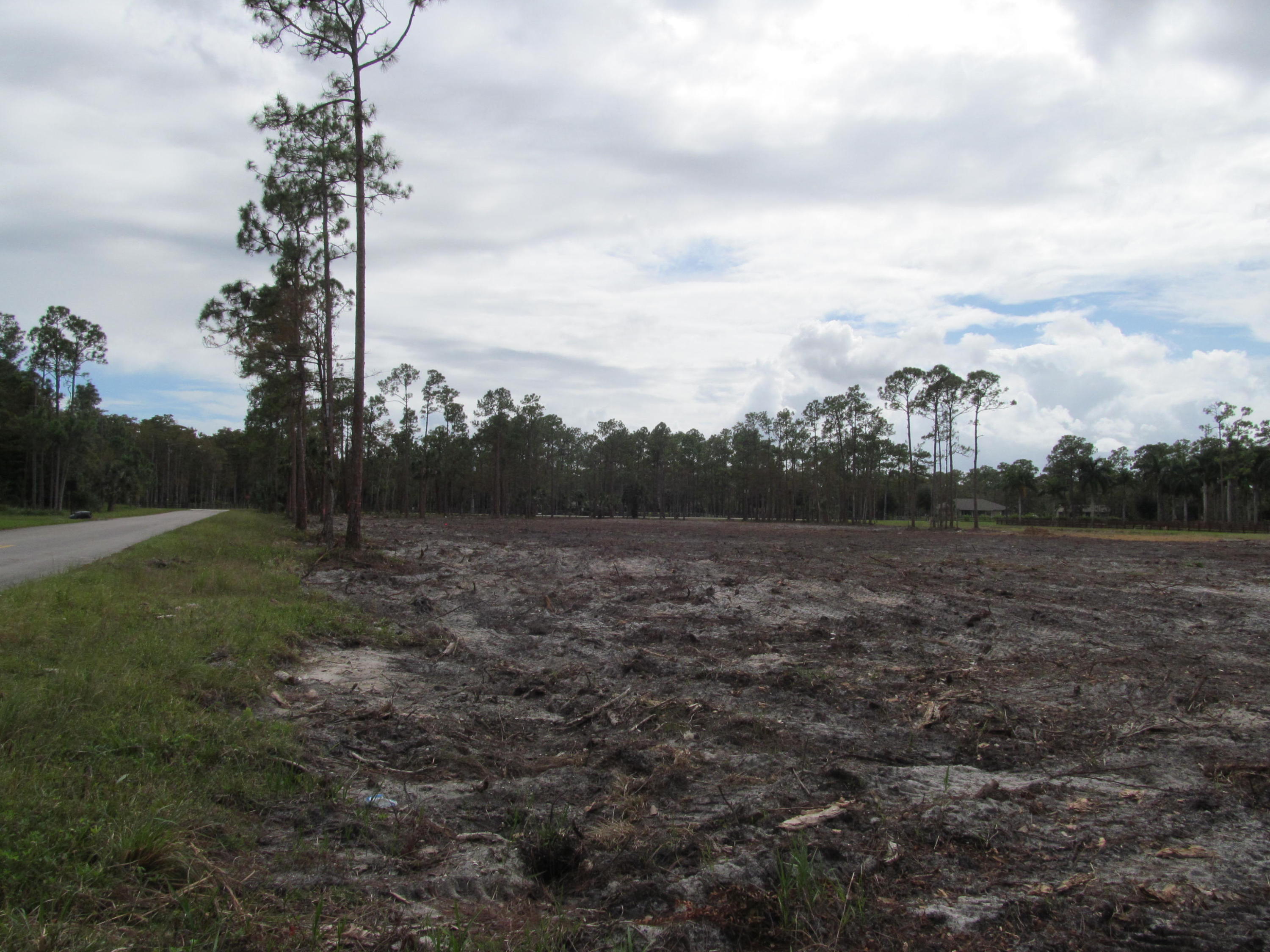 6185 Homeland Road Wellington, FL 33449 - Photo 3 of 7 Corner lot doesn't have neighbore
