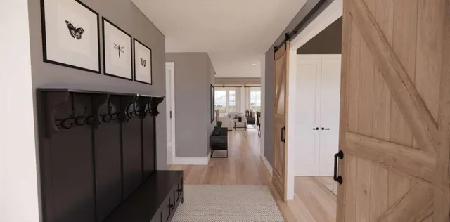 a living room with furniture and a lamp