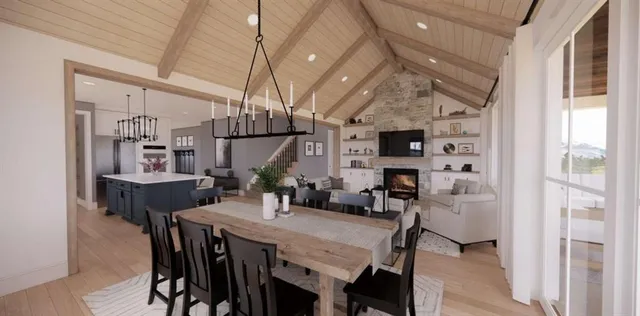 a living room with furniture or couch and a wooden floor