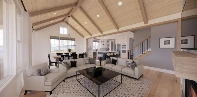 a kitchen with a table chairs refrigerator and cabinets