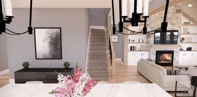 a living room with furniture a flat screen tv and a window