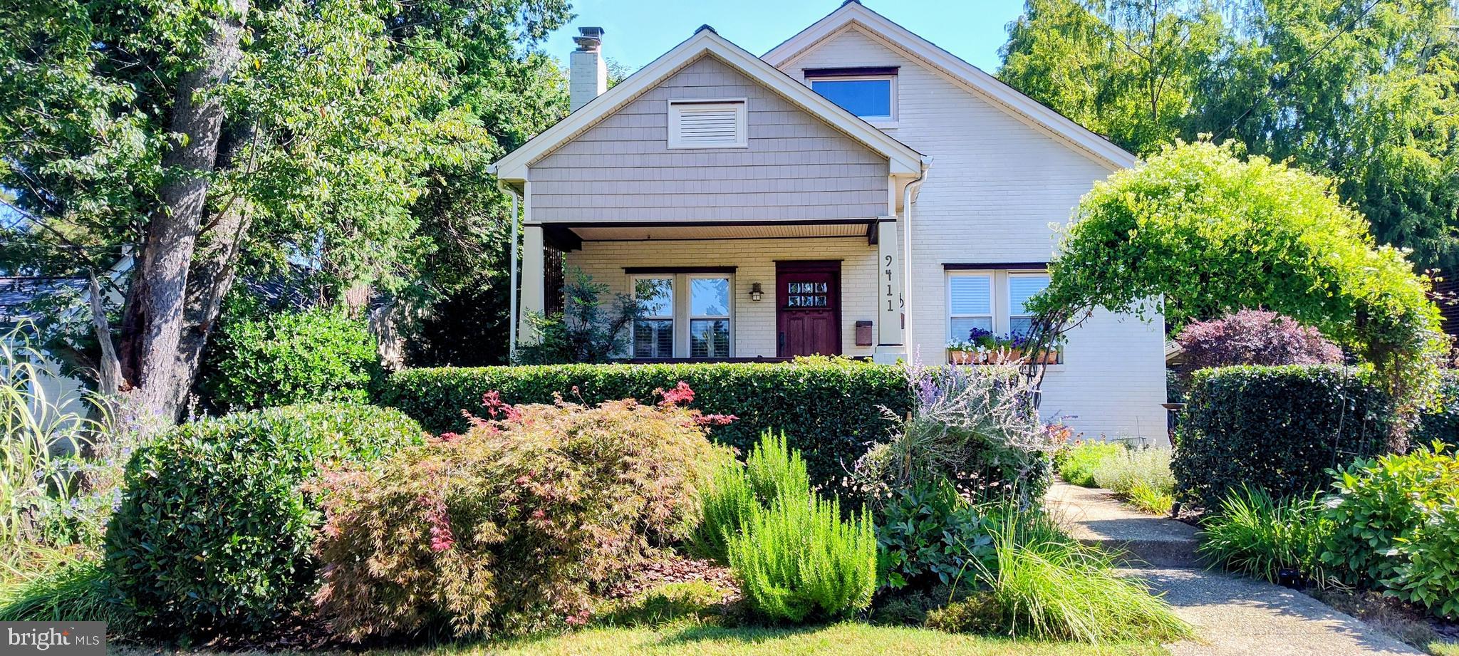 9411 Garwood Street Silver Spring, MD 20901 - Photo 1 of 90 a front view of a house with a yard
