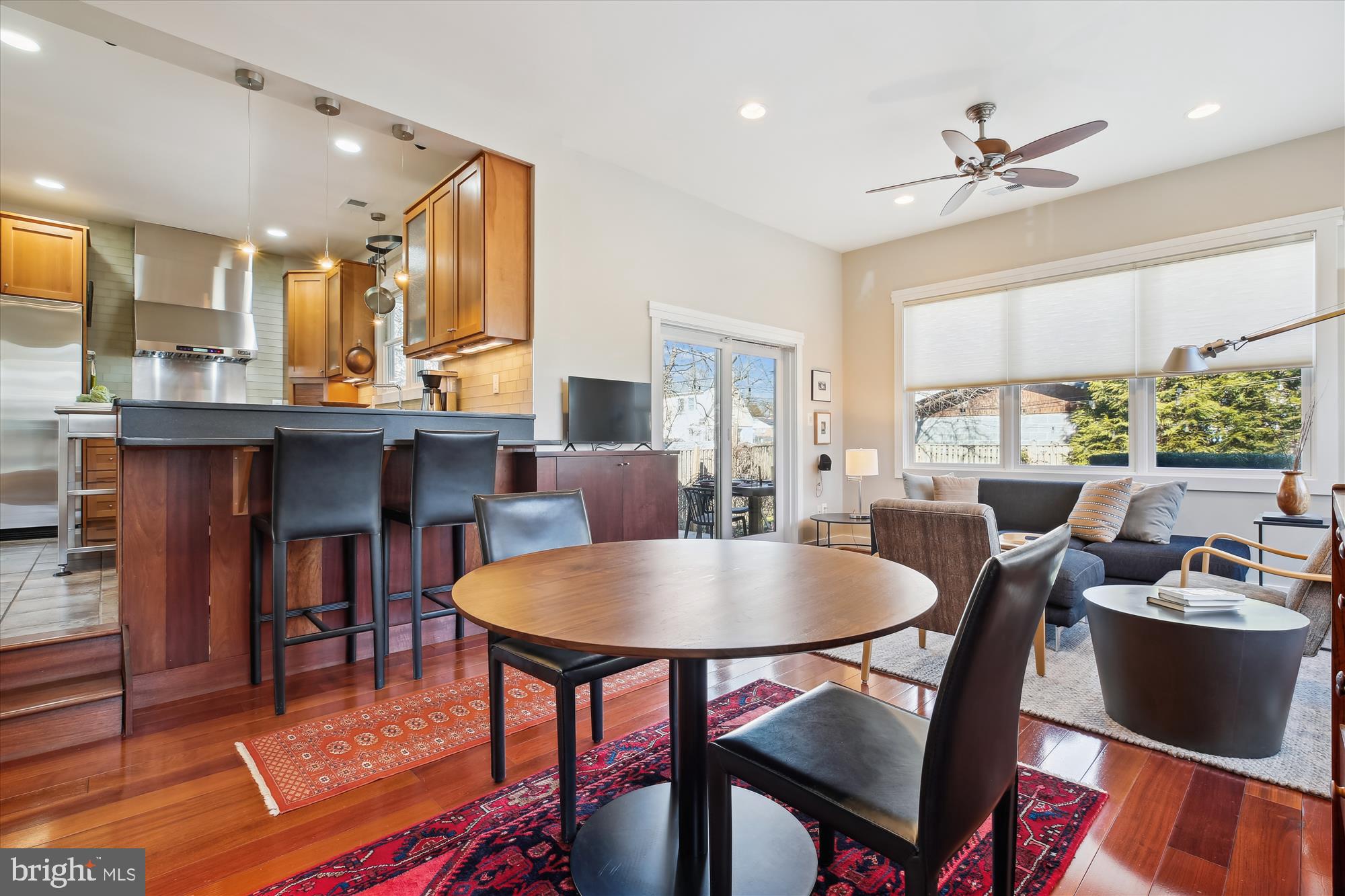 9411 Garwood Street Silver Spring, MD 20901 - Photo 16 of 90 a view of a dining room with furniture window and wooden floor