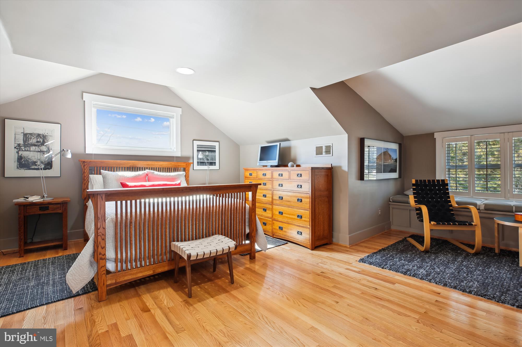 9411 Garwood Street Silver Spring, MD 20901 - Photo 29 of 90 a bedroom with furniture and a wooden floor