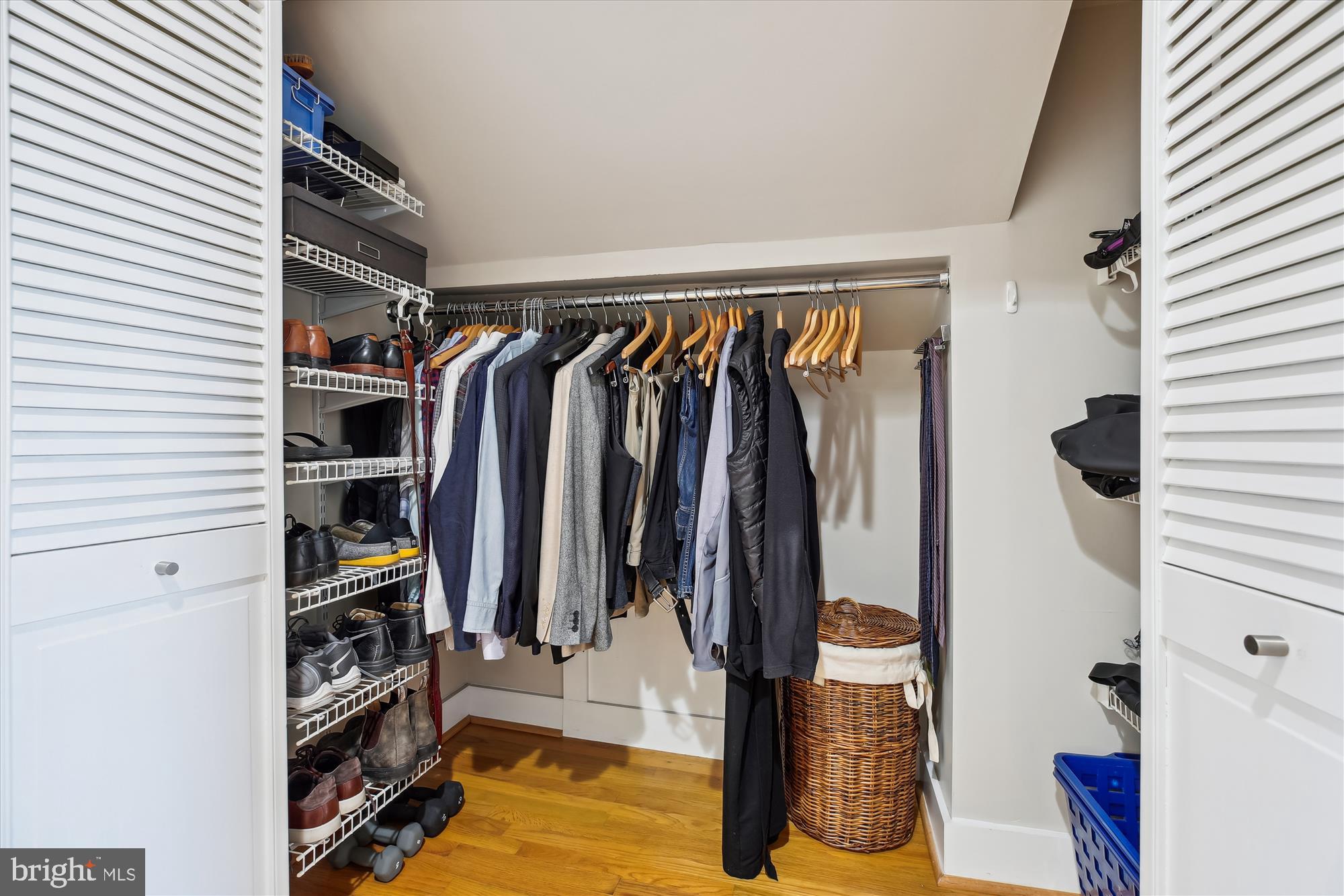 9411 Garwood Street Silver Spring, MD 20901 - Photo 37 of 90 a view of walk in closet with clothes and shoes