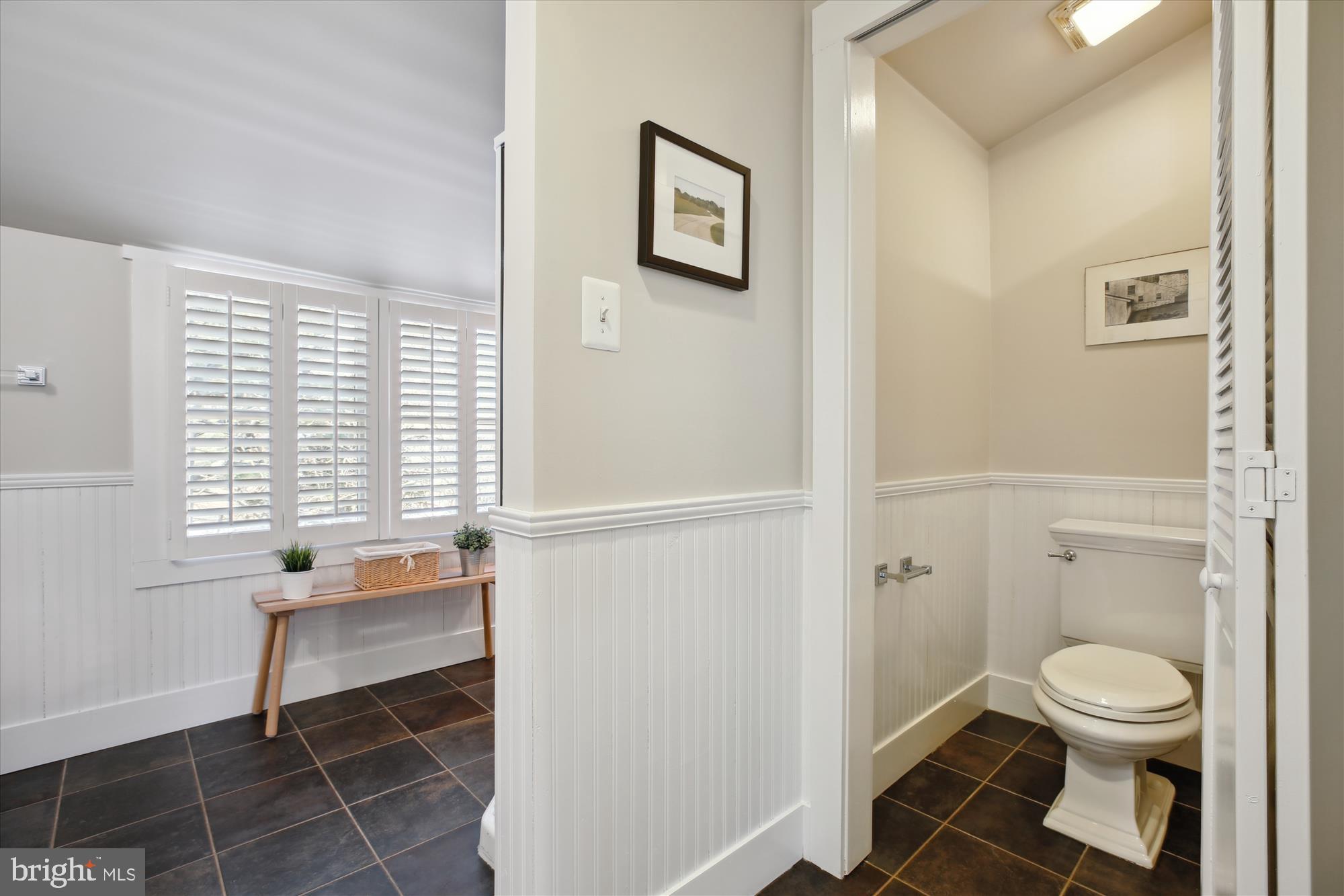 9411 Garwood Street Silver Spring, MD 20901 - Photo 48 of 90 a bathroom with a toilet and a shower