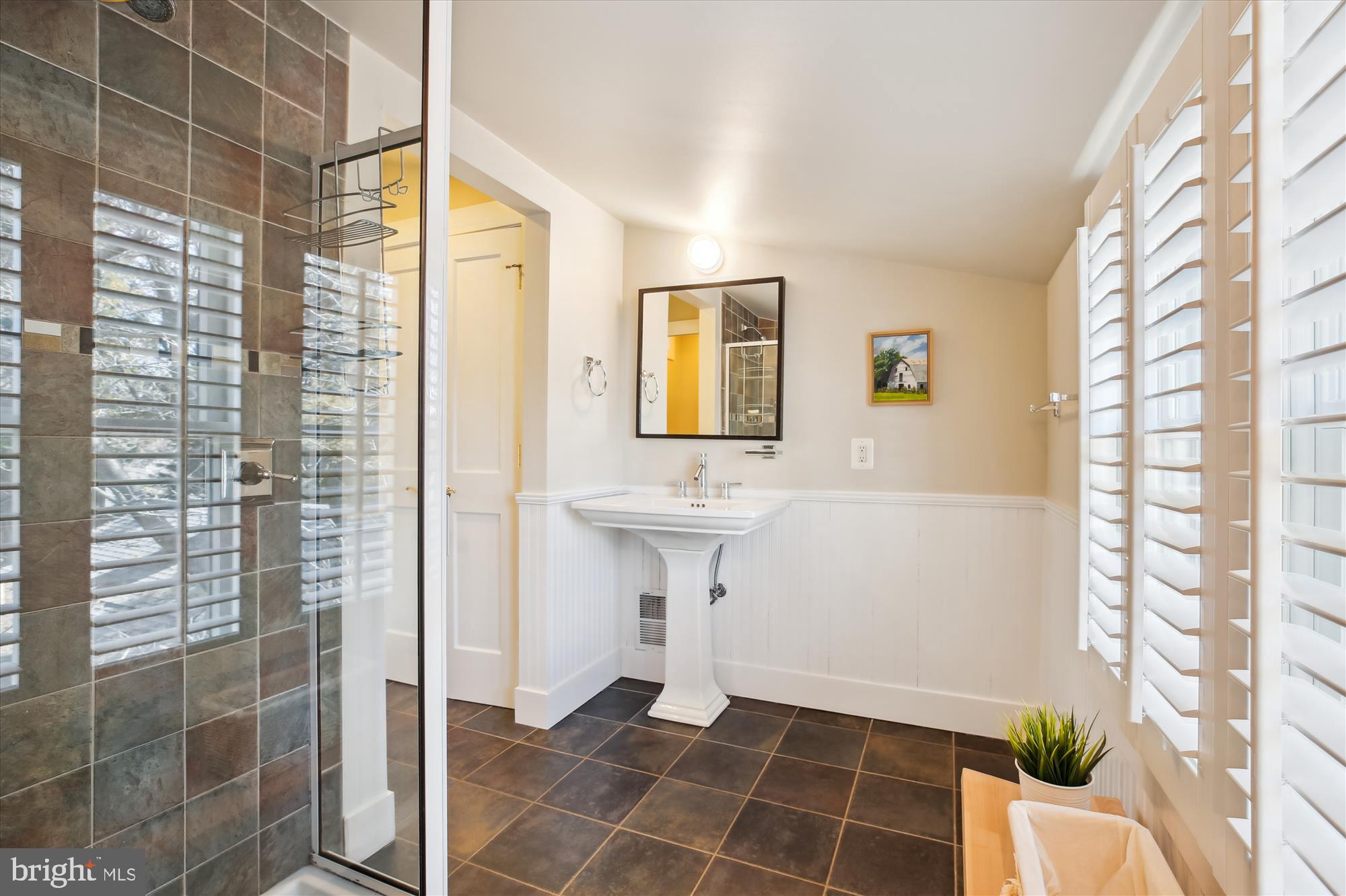 9411 Garwood Street Silver Spring, MD 20901 - Photo 49 of 90 a bathroom with a sink toilet and shower