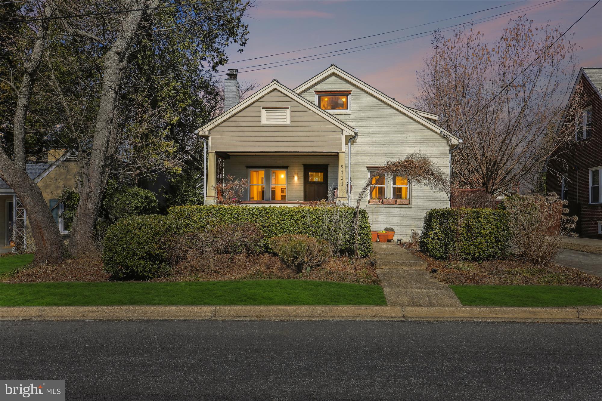 9411 Garwood Street Silver Spring, MD 20901 - Photo 64 of 90 a front view of a house with a yard