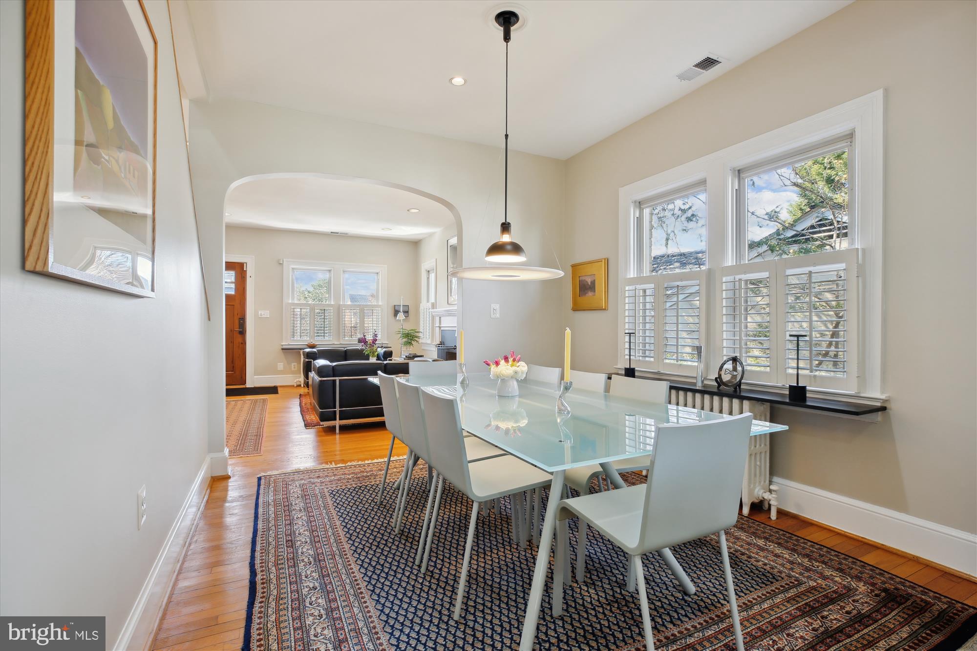 9411 Garwood Street Silver Spring, MD 20901 - Photo 9 of 90 a view of a dining room with furniture window and wooden floor