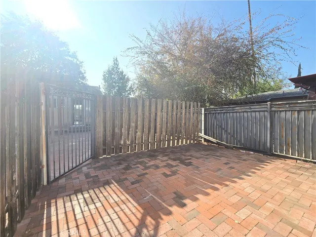 a view of a house with a snow on the road