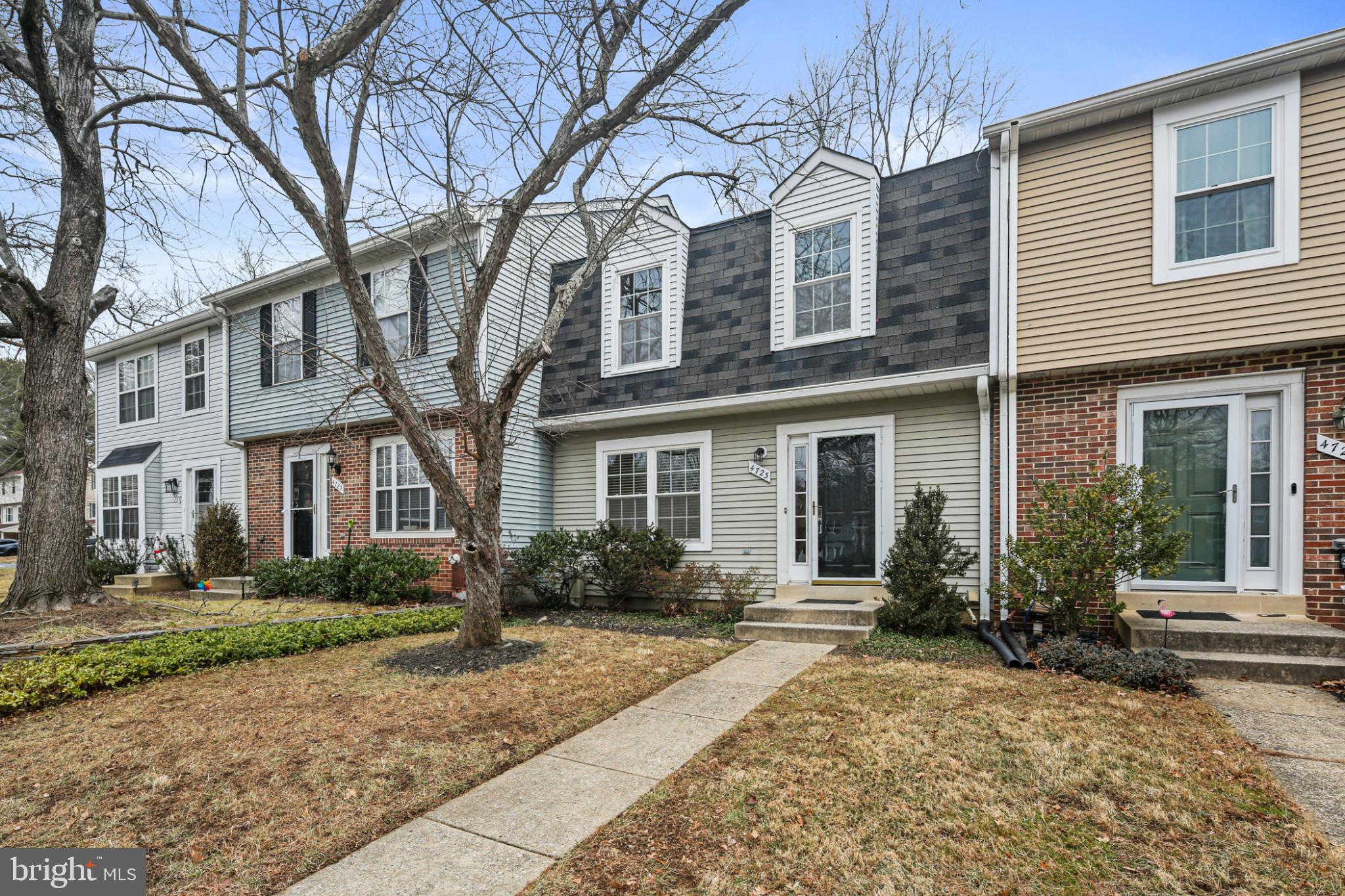 Charming townhomes with inviting pathways.