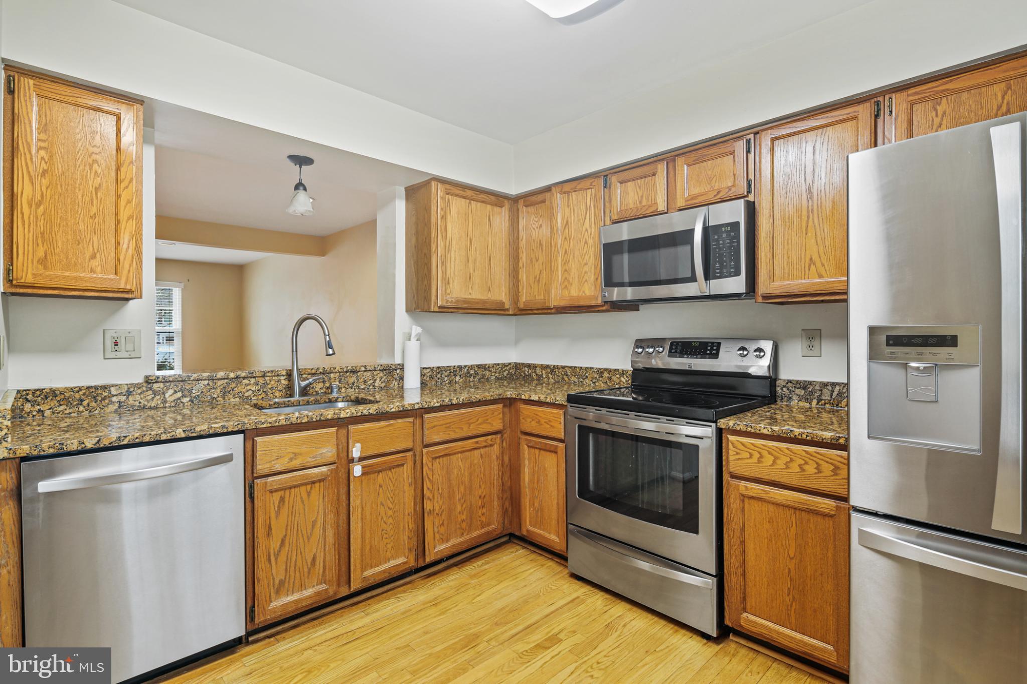 4723 Hallowed Streme Ellicott City, MD 21042 - Photo 9 of 40 Modern kitchen with sleek finishes.