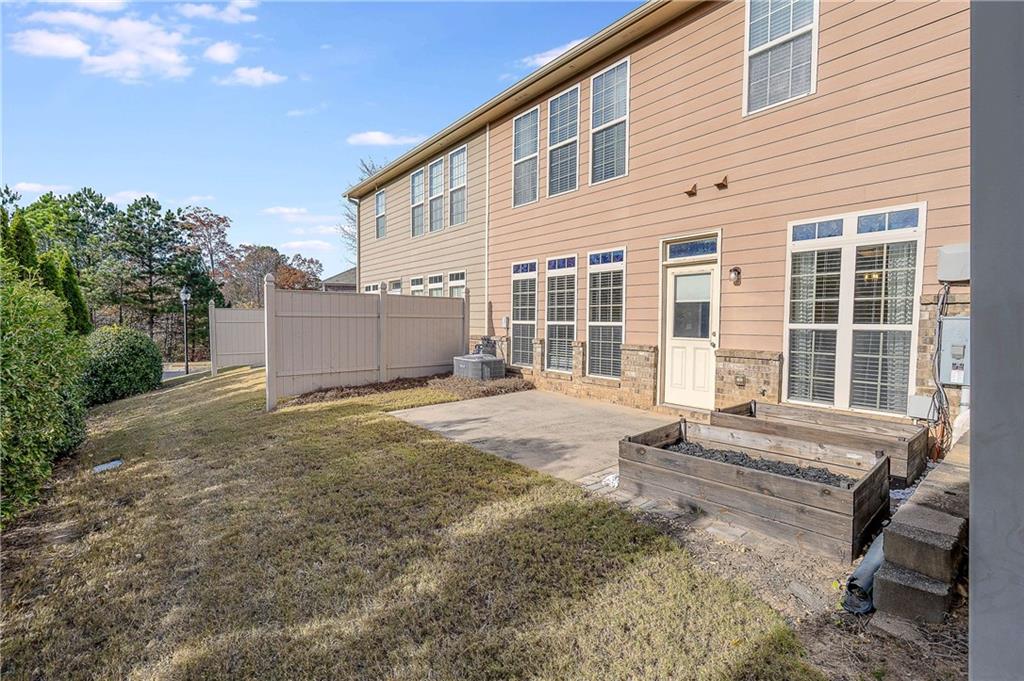 3546 Flycatcher Way Duluth, GA 30097 - Photo 24 of 30 a house view with a backyard space