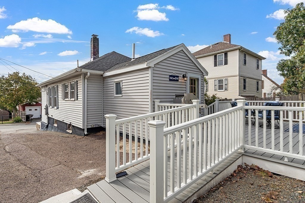 26 Madison Square Gloucester, MA 01930 - Photo 25 of 27 a view of a house with wooden fence