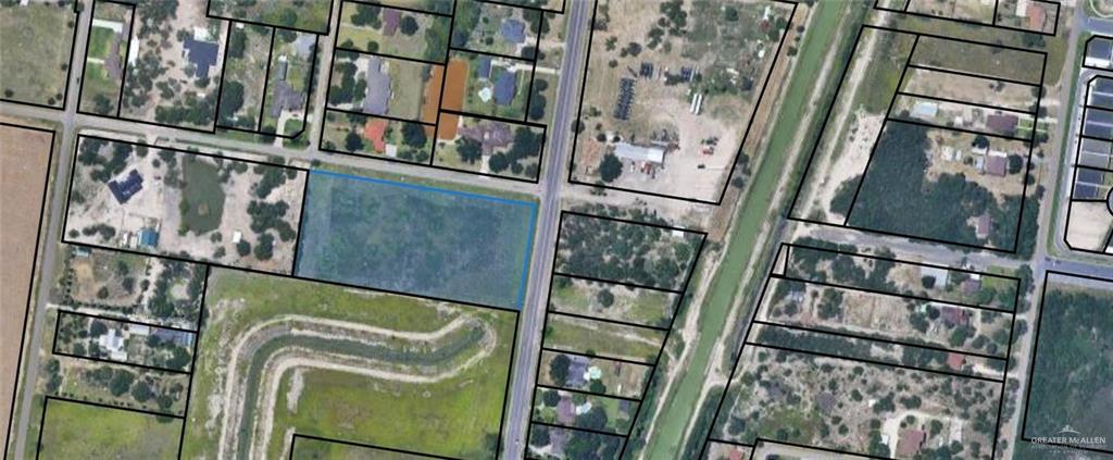 4153 Mile 7 Road McAllen, TX 78504 - Photo 4 of 4 a close up of a street sign