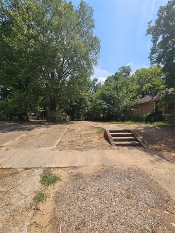 a view of outdoor space and yard