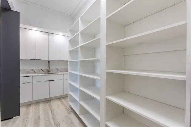 a view of a roof deck with furniture