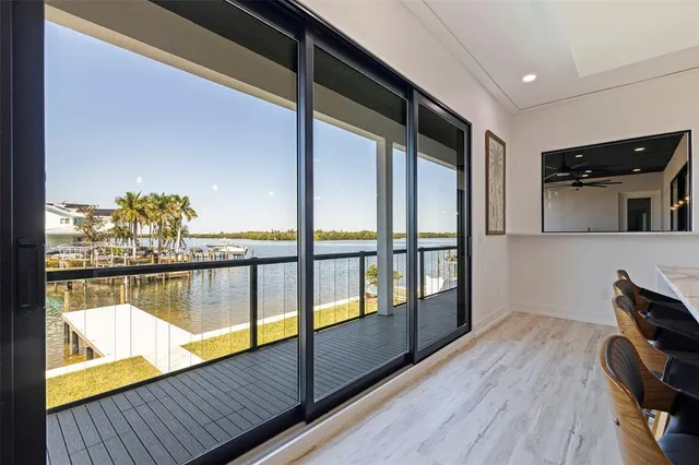 a view of swimming pool with outdoor seating