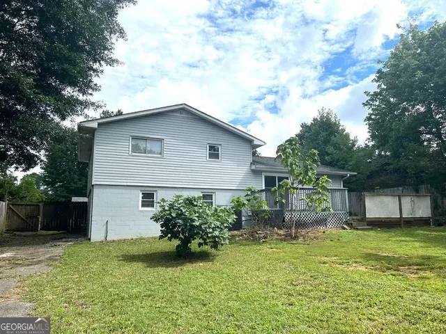 a house view with a garden space